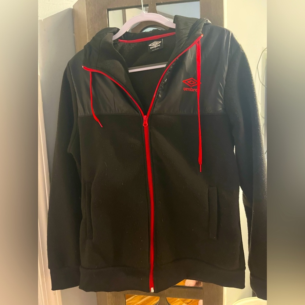 Boys Umbro Black with red accents Fits like a 14